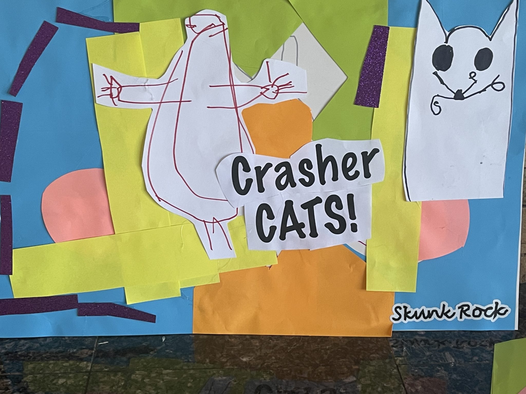 Paper collage titled Crasher Cats with hand-drawn cats on bright colored paper